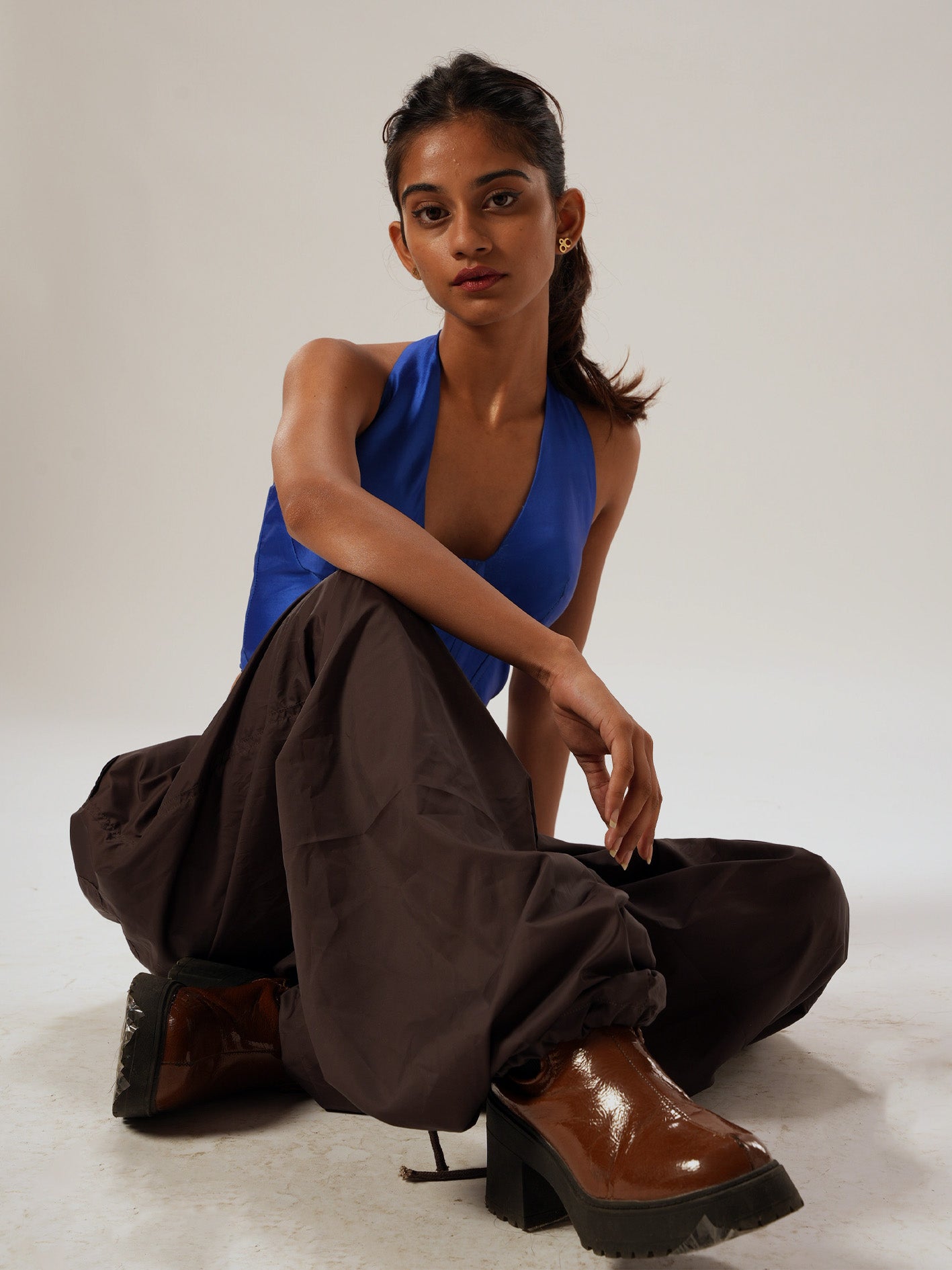 Brown Parachute trousers.