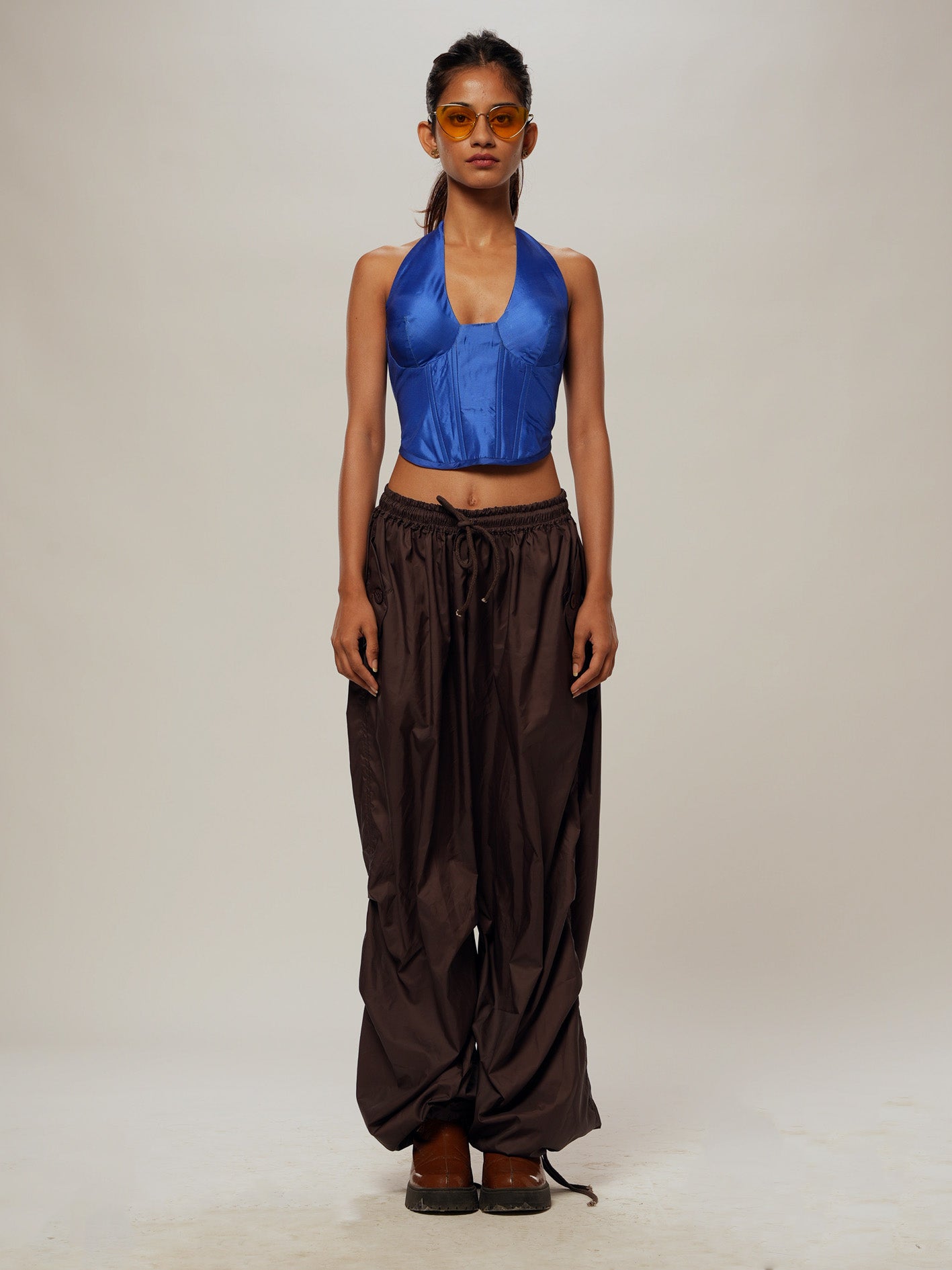 Brown Parachute trousers.